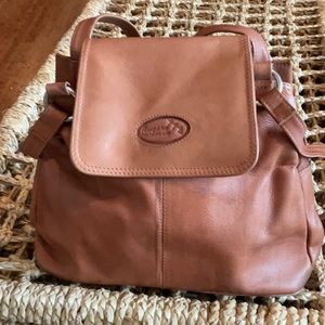 Rugerero leather hard bottom hobo bag. (Cancun)